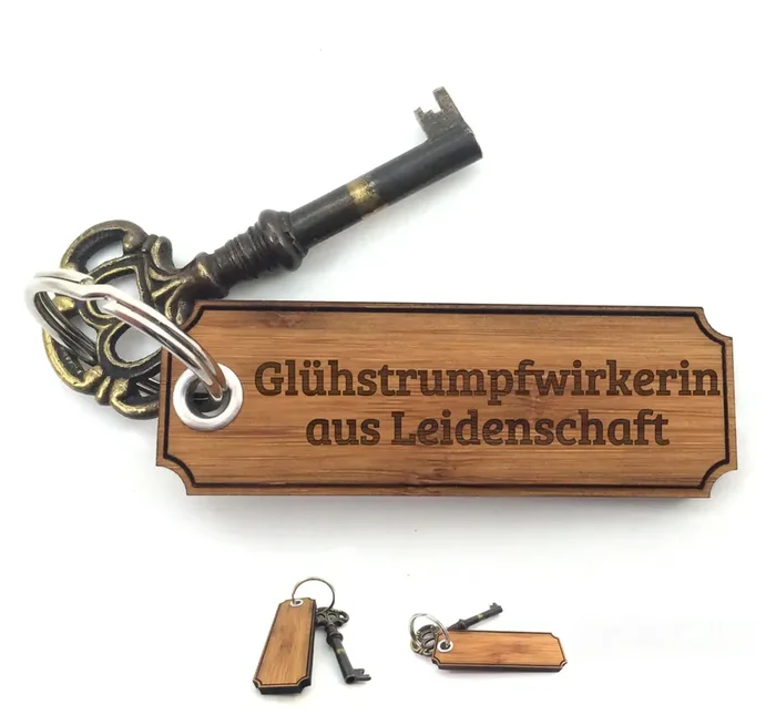 Schlüsselanhänger Glühstrumpfwirkerin